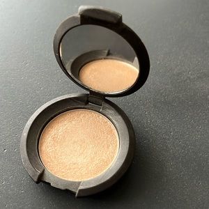 Becca mini champagne pop highlighter travel sz1.15g